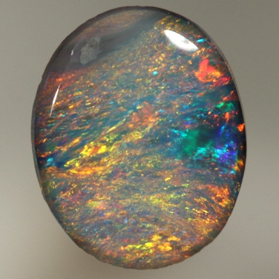 SOLID SEMI BLACK OPAL Burning red and orange over turquoise